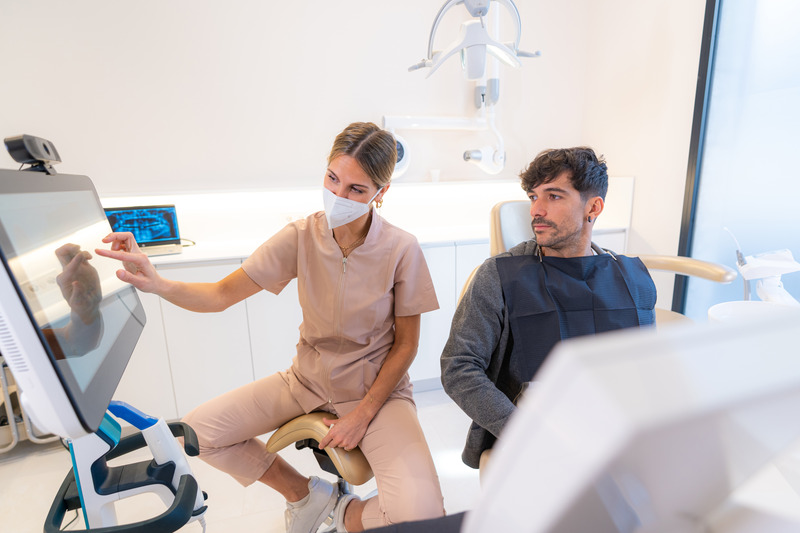 Patient at dentist checking for gingivitis and gum cancer